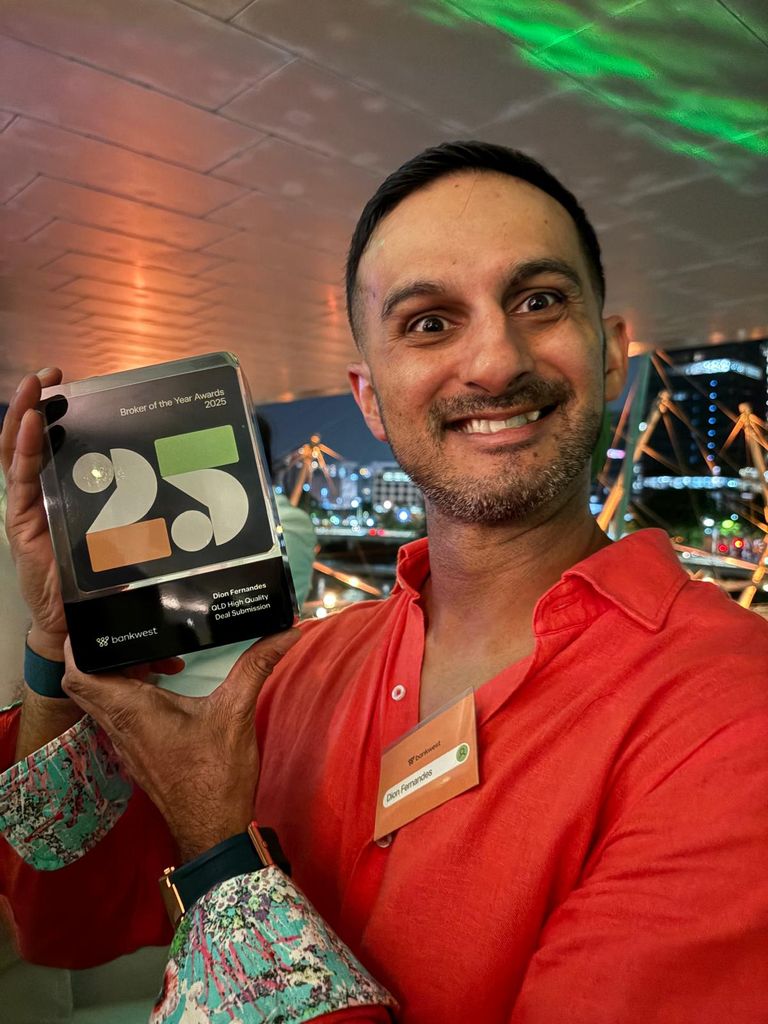 Dion Fernandes holding the 2025 BankWest Broker of the Year QLD High Quality Deal Submission award